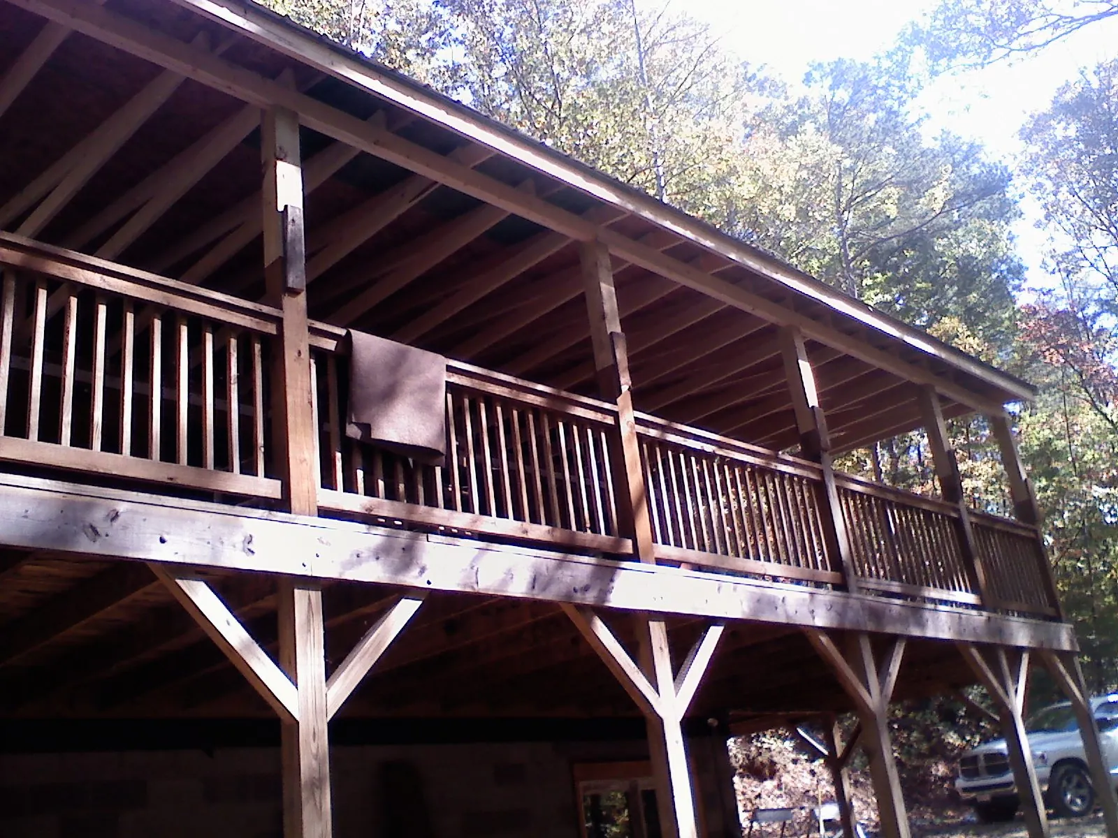 Timber framing under a new elevated porch and deck — Roof Leak Repair in Meansville by Roofing Brothers